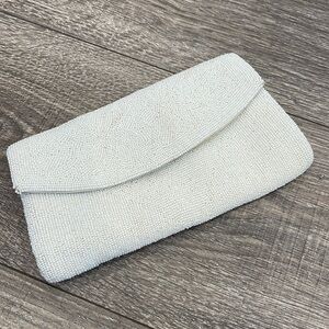 Vintage beaded clutch bag with snap closure